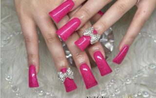 ピンクラメとリボンパーツのダックネイル｜NailSalon BARON施術例