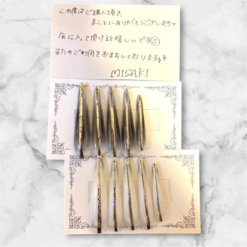 黒系とクリアのチップにゴールド色の縦ラインを合わせた、BARON商品158491246の10本