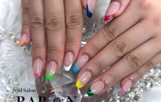 BARON gel nail design with a different colored French tip on each finger